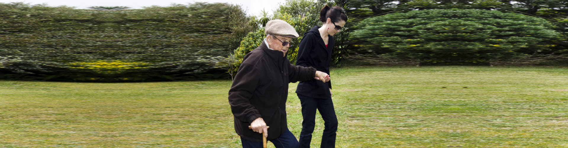 senior man assisted by her daughter