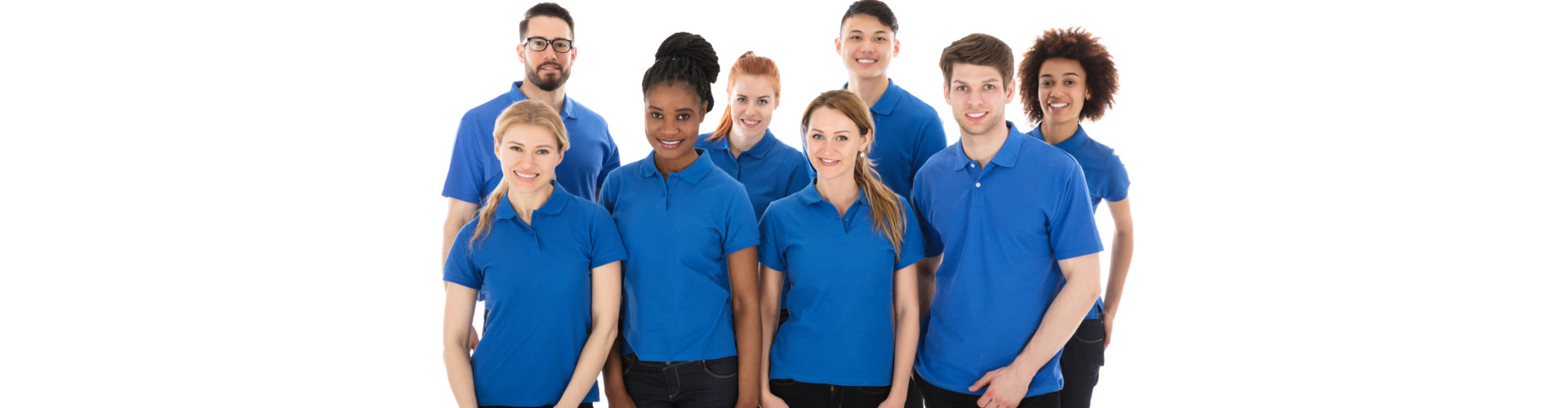 teens wearing blue shirt smiling